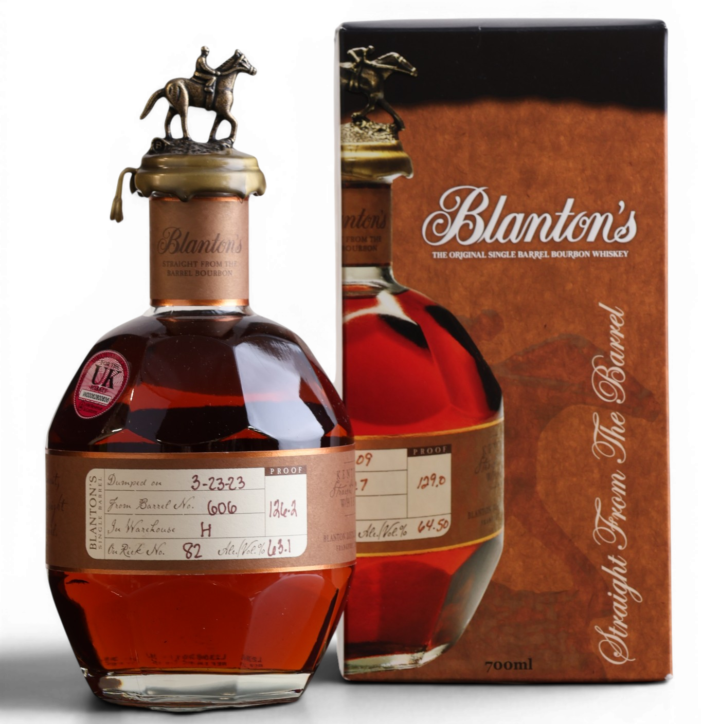 A bottle of Blanton's Straight From The Barrel single malt Scotch whisky with its brown cardboard box, featuring a horse-shaped metal cap, set against a plain white background.
