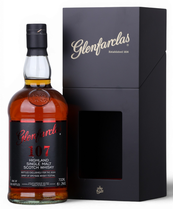 A bottle of Glenfarclas 107 Highland Single Malt Scotch Whisky next to its black presentation box with gold lettering, on a white background.